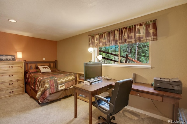 bedroom featuring light colored carpet