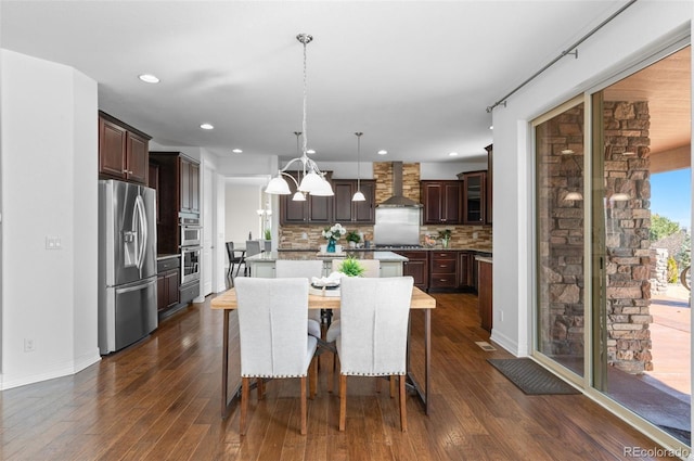 dining room featuring a notable chandelier, dark wood-style flooring, baseboards, and recessed lighting