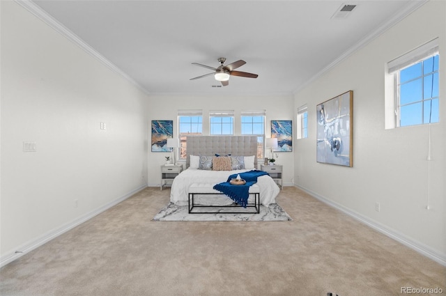 bedroom featuring baseboards, visible vents, a ceiling fan, ornamental molding, and carpet flooring