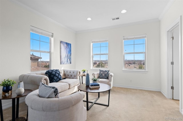 living area with light carpet, a healthy amount of sunlight, baseboards, and crown molding