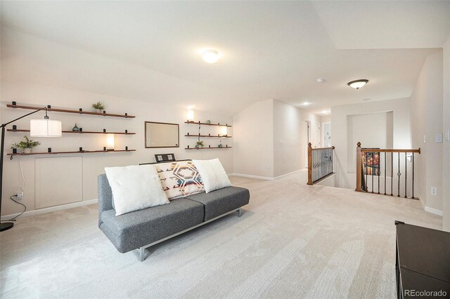 living room with light carpet and baseboards