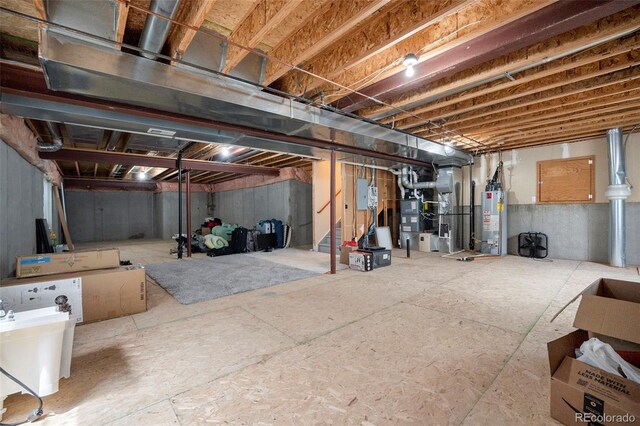 unfinished basement with water heater, heating unit, and electric panel