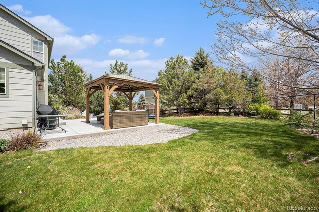 view of green lawn with a gazebo, a patio, and outdoor lounge area