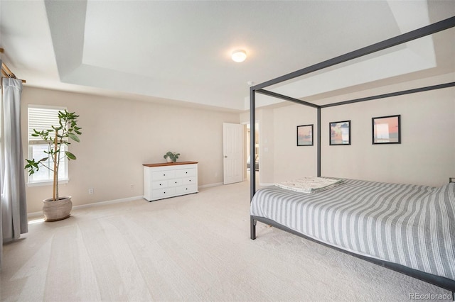 carpeted bedroom with baseboards