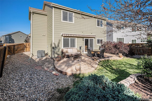 10359 Tracewood Dr, Highlands Ranch, CO 80130 - rear view of house with a patio area and outdoor lounge area