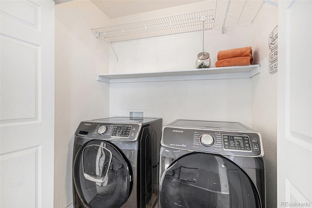 10359 Tracewood Dr, Highlands Ranch, CO 80130 - clothes washing area featuring washer and clothes dryer