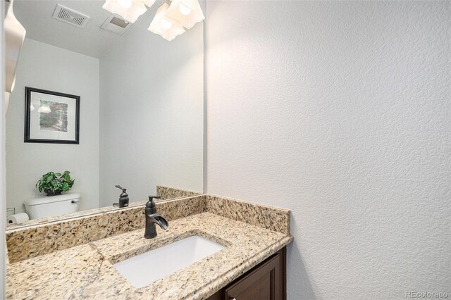 10359 Tracewood Dr, Highlands Ranch, CO 80130 - bathroom featuring toilet and vanity