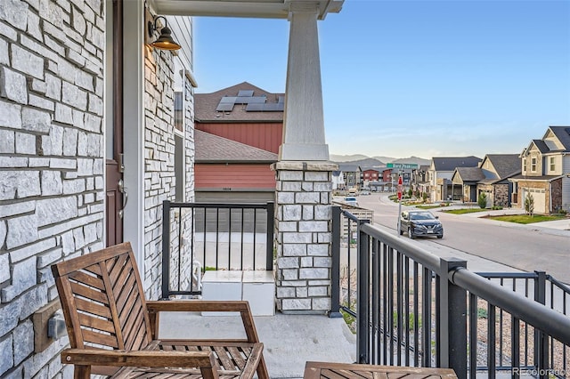 balcony featuring a residential view