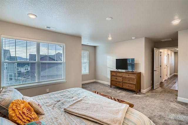 carpeted bedroom with baseboards and recessed lighting