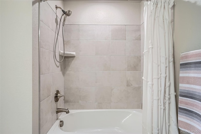 full bathroom with shower / bath combo with shower curtain