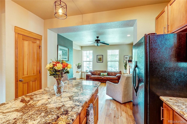 3354 Wabash St, Denver, CO 80238 - dining space featuring light wood finished floors and a ceiling fan