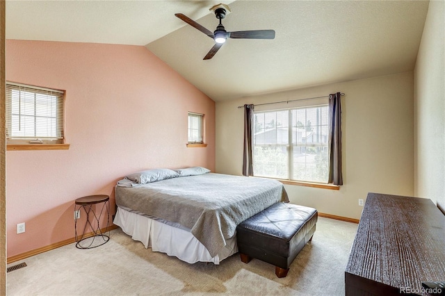 3354 Wabash St, Denver, CO 80238 - bedroom with multiple windows, lofted ceiling, light carpet, and ceiling fan