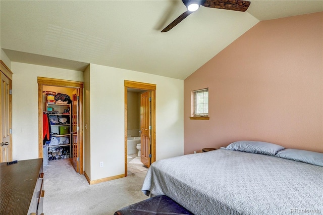 3354 Wabash St, Denver, CO 80238 - bedroom featuring light colored carpet, a spacious closet, lofted ceiling, a closet, and ensuite bathroom