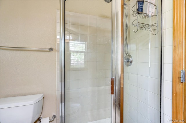 3354 Wabash St, Denver, CO 80238 - bathroom with a shower stall and toilet