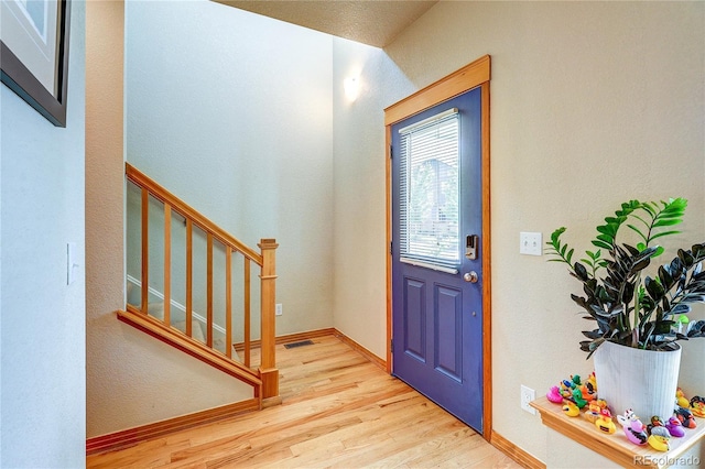 3354 Wabash St, Denver, CO 80238 - entryway with wood finished floors and stairs