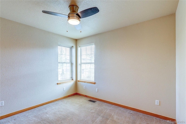 3354 Wabash St, Denver, CO 80238 - empty room featuring light carpet and ceiling fan