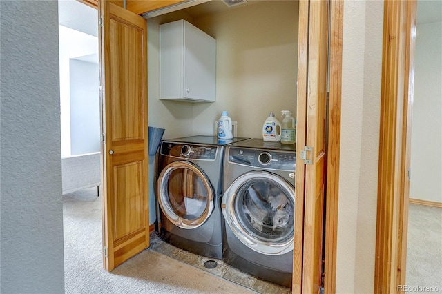 3354 Wabash St, Denver, CO 80238 - laundry room with carpet floors, washer and dryer, and a textured wall