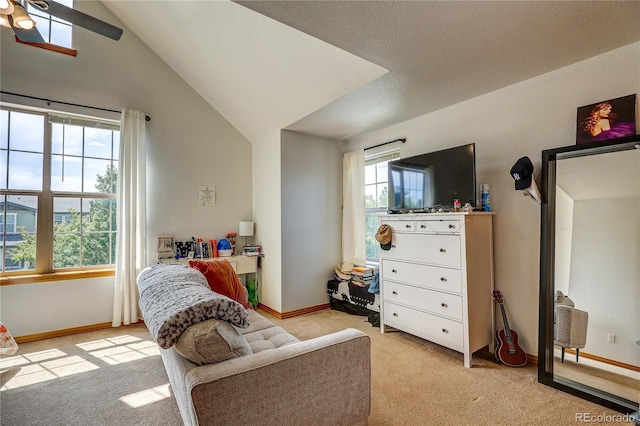 3354 Wabash St, Denver, CO 80238 - sitting room with light colored carpet, lofted ceiling, a skylight, and a ceiling fan