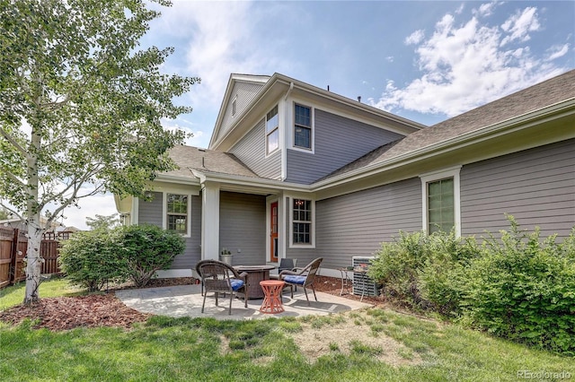 3354 Wabash St, Denver, CO 80238 - rear view of property with a patio area, a fire pit, and roof with shingles