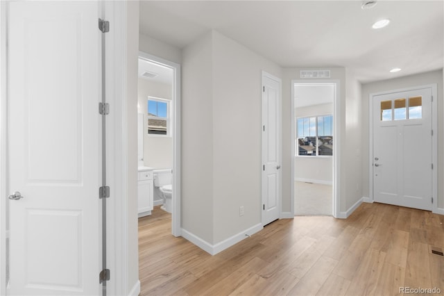 entrance foyer featuring light hardwood / wood-style floors