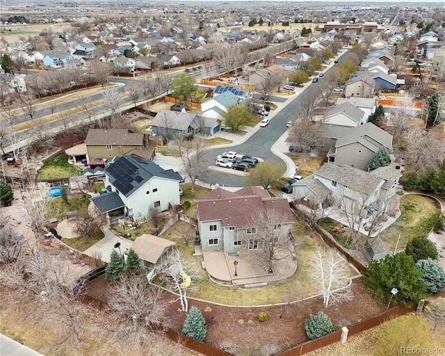birds eye view of property with a residential view