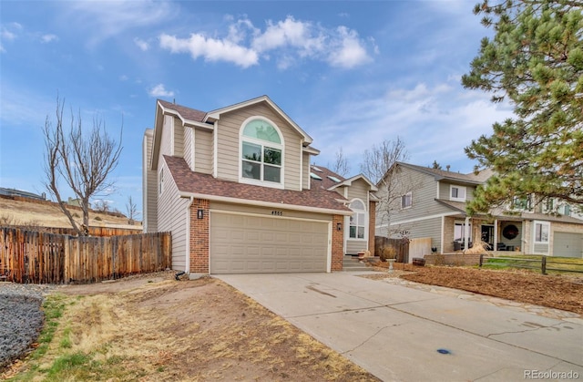 view of front of property with a garage