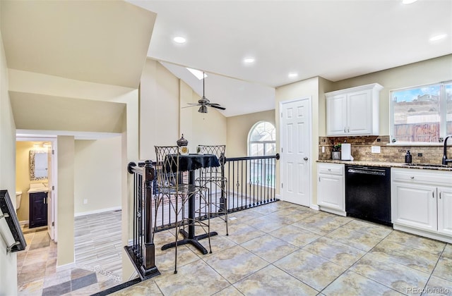 kitchen featuring white cabinetry, dishwasher, and plenty of natural light