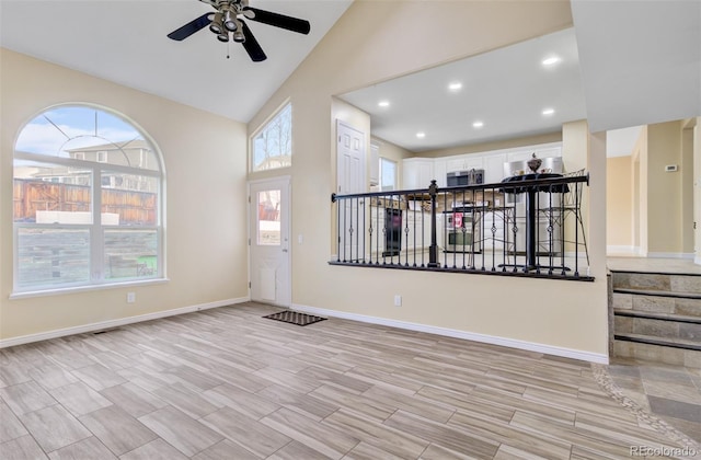 interior space with light hardwood / wood-style flooring, plenty of natural light, and ceiling fan