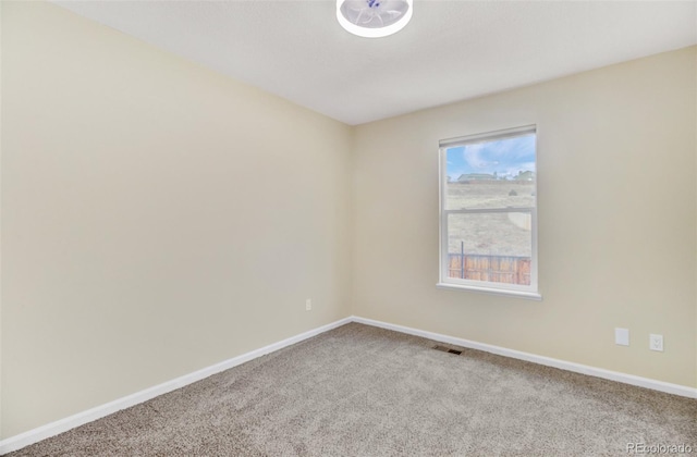 view of carpeted spare room