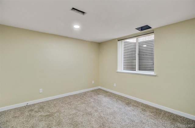 view of carpeted spare room