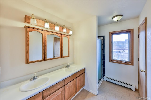 bathroom featuring a baseboard radiator, a shower with shower door, tile flooring, large vanity, and double sink