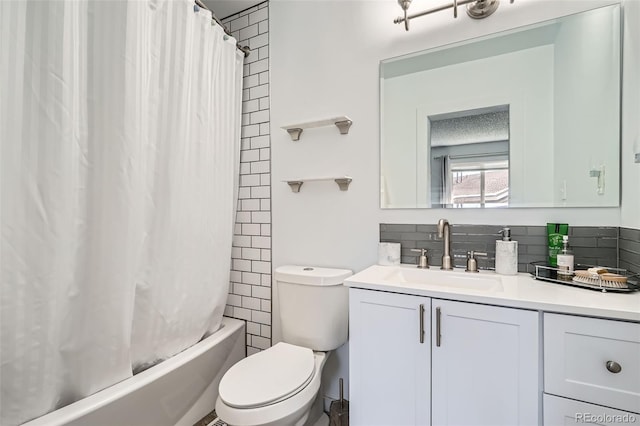 full bathroom with decorative backsplash, vanity, toilet, and shower / tub combo with curtain