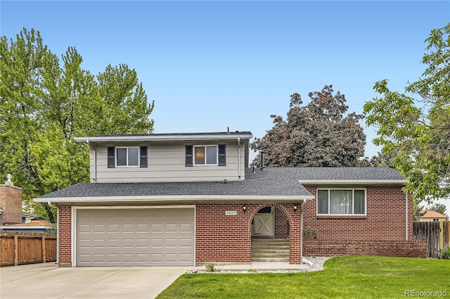 13123 Spica Dr, Lone Tree, CO 80124 - view of front of property with concrete driveway, an attached garage, brick siding, and roof with shingles