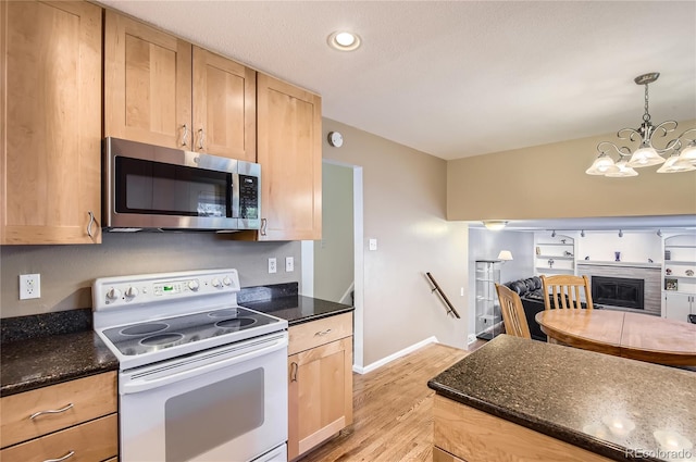 13123 Spica Dr, Lone Tree, CO 80124 - kitchen featuring stainless steel microwave, white electric stove, light brown cabinets, light wood-style flooring, and recessed lighting