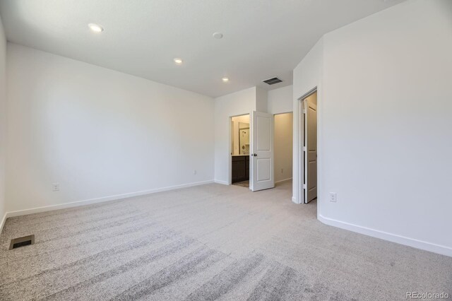 1974 S Haleyville Way, Aurora, CO 80018 - empty room with light colored carpet, baseboards, and recessed lighting