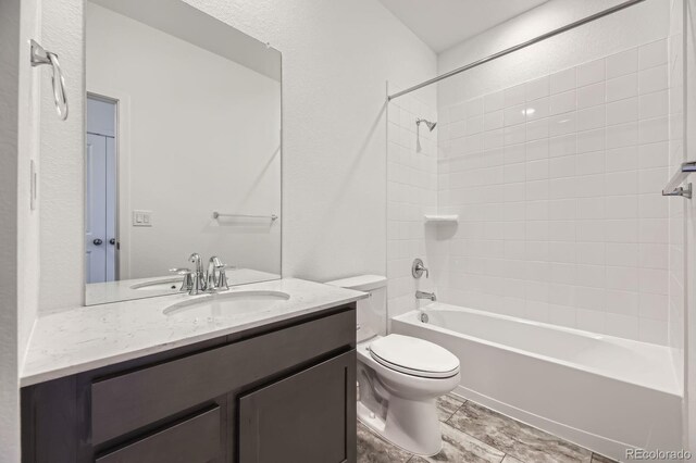 1974 S Haleyville Way, Aurora, CO 80018 - full bath featuring vanity, toilet, and tub / shower combination