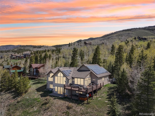 50 Spinning Leaf Trl, Silverthorne, CO 80498 - aerial view of property and surrounding area featuring a mountainous background and a forest