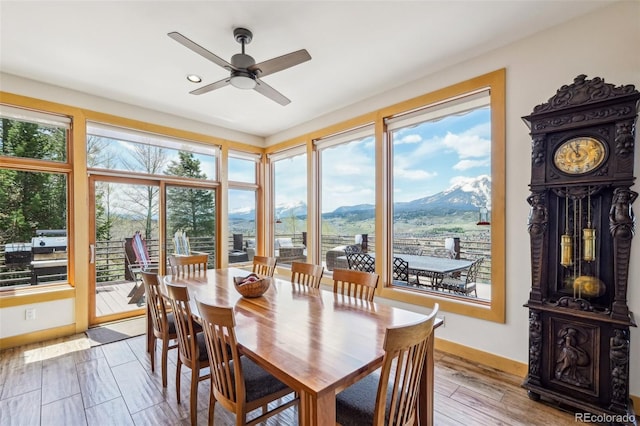 50 Spinning Leaf Trl, Silverthorne, CO 80498 - dining room featuring a mountain view, ceiling fan, baseboards, wood finished floors, and recessed lighting