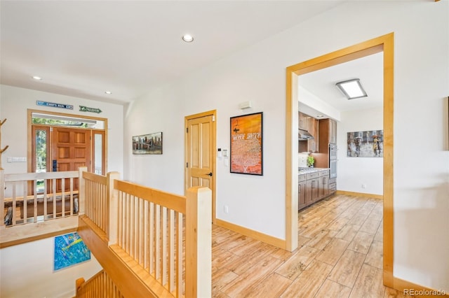 50 Spinning Leaf Trl, Silverthorne, CO 80498 - hallway featuring an upstairs landing, light wood finished floors, recessed lighting, and baseboards