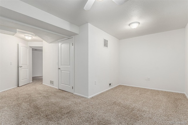 1451 S Quitman St, Denver, CO 80219 - basement with visible vents, baseboards, ceiling fan, and carpet floors