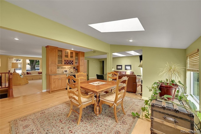 6425 W Frost Dr, Littleton, CO 80128 - dining space with light wood-style flooring, a skylight, and recessed lighting