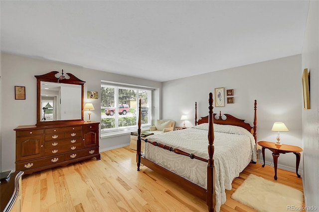 6425 W Frost Dr, Littleton, CO 80128 - bedroom with light wood-style floors and baseboards