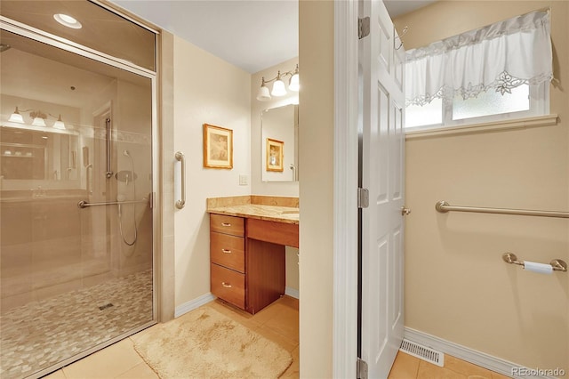 6425 W Frost Dr, Littleton, CO 80128 - bathroom featuring vanity, a shower stall, and tile patterned floors