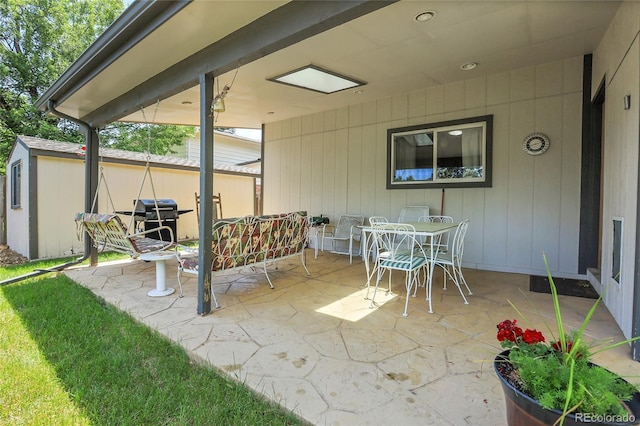 6425 W Frost Dr, Littleton, CO 80128 - view of patio with outdoor dining area and grilling area