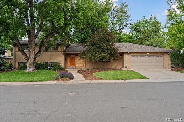3190 S Detroit St, Denver, CO 80210 - view of front of property featuring an attached garage, concrete driveway, and a front yard
