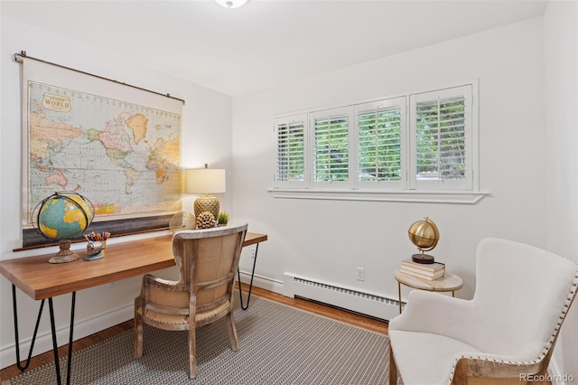 3190 S Detroit St, Denver, CO 80210 - office area featuring a baseboard heating unit and wood finished floors