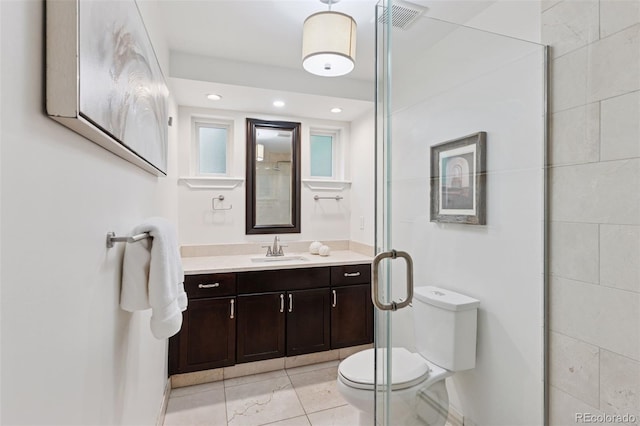 3190 S Detroit St, Denver, CO 80210 - full bathroom featuring vanity, recessed lighting, and a shower with shower door