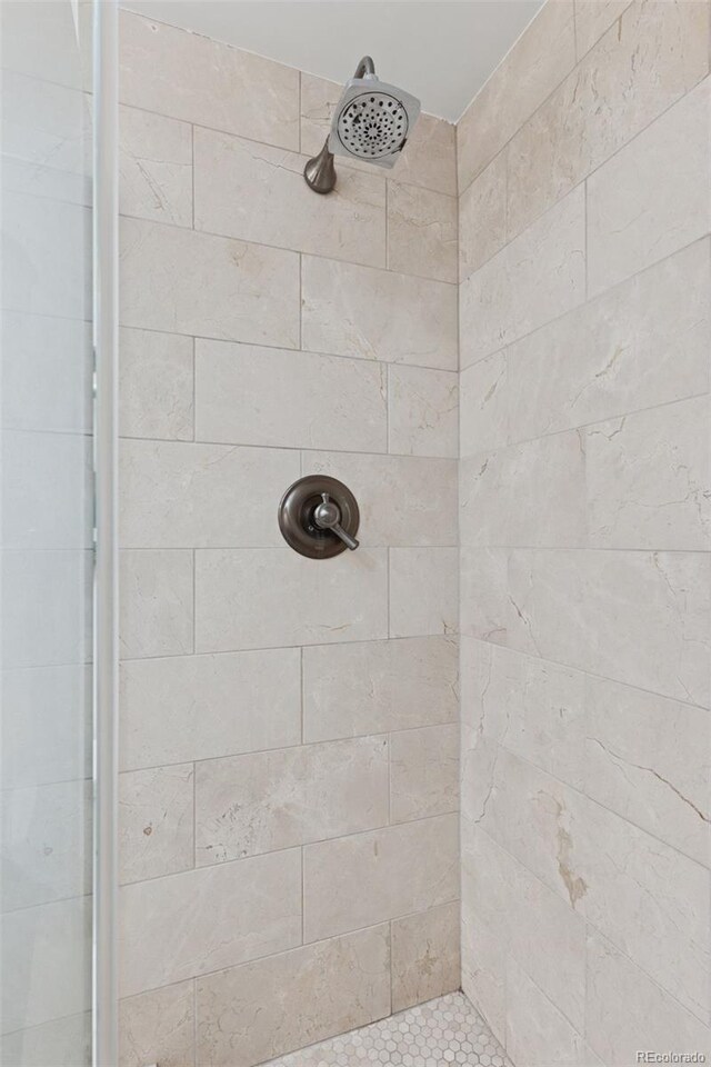 3190 S Detroit St, Denver, CO 80210 - bathroom featuring tiled shower