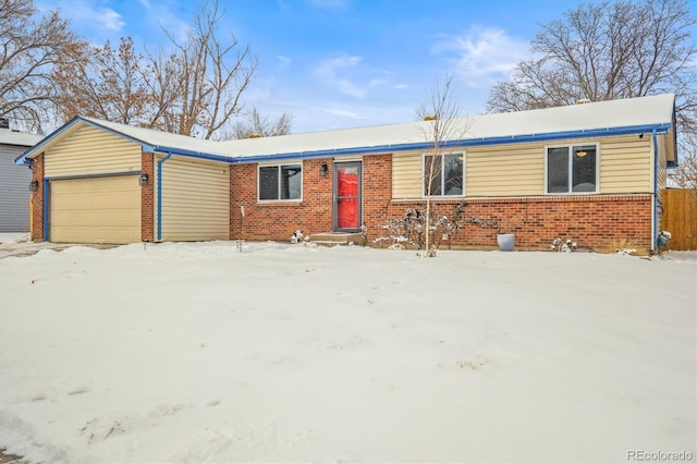 single story home featuring a garage