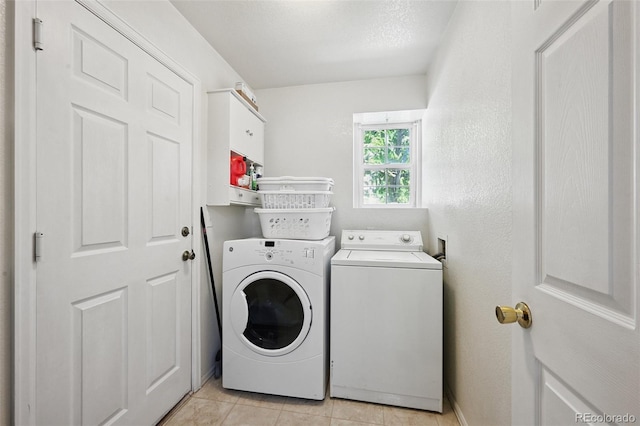 10223 Vine Ct, Thornton, CO 80229 - laundry area with washing machine and dryer and light tile patterned floors